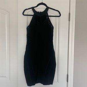 Black bodycon dress with mesh cutouts
